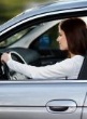 Woman driving with Car Hire Excess cover